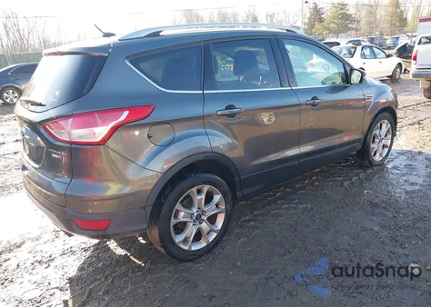 2015 Ford Escape Titanium z USA, uszkodzony, nr VIN 1FMCU9J91FUC02880